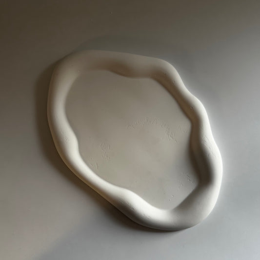 Bubble cornered oval shaped coaster